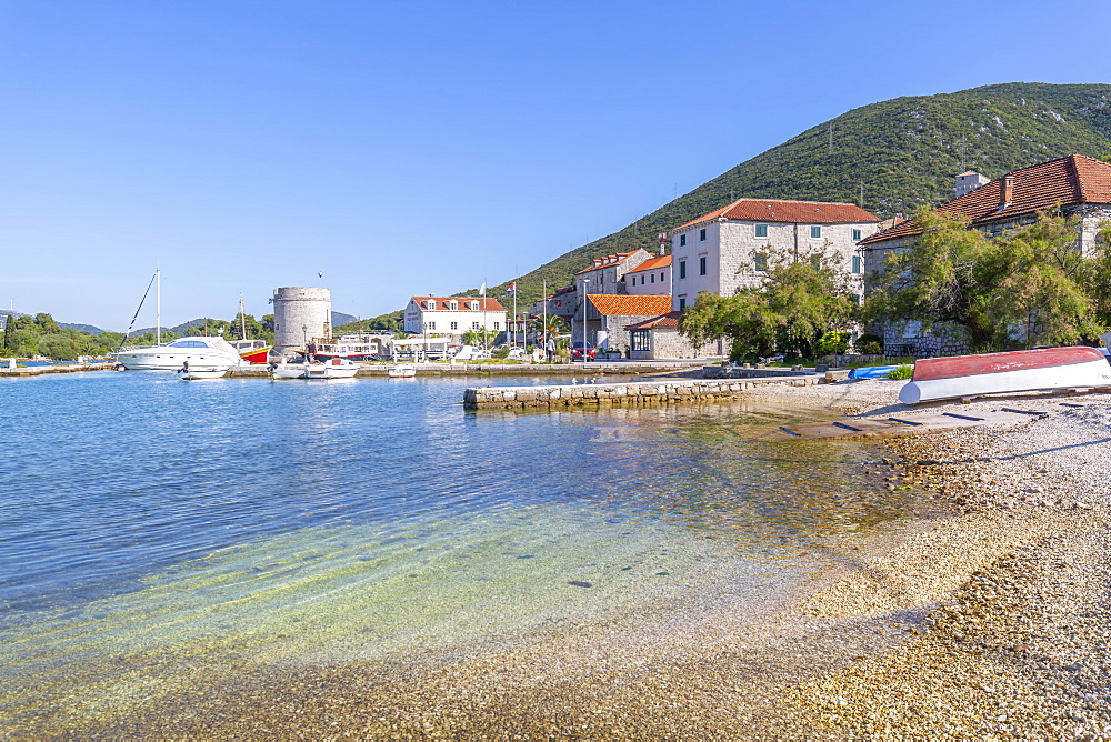 View of small harbour boats and restaurants in Mali Ston, Dubrovnik Riviera, Croatia, Europe