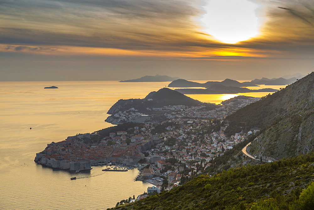 Panoramic view of the Old Walled City of Dubrovnik at sunset, UNESCO World Heritage Site, Dubrovnik Riviera, Croatia, Europe