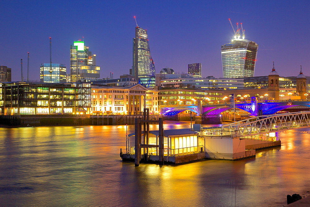 River Thames and City of London skyline at dusk, London, England, United Kingdom, Europe 