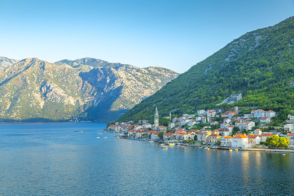 View towards Church of St. Eustachius, Dobrota, on the Adriatic Coast at sunrise, Kotor, Montenegro, Europe