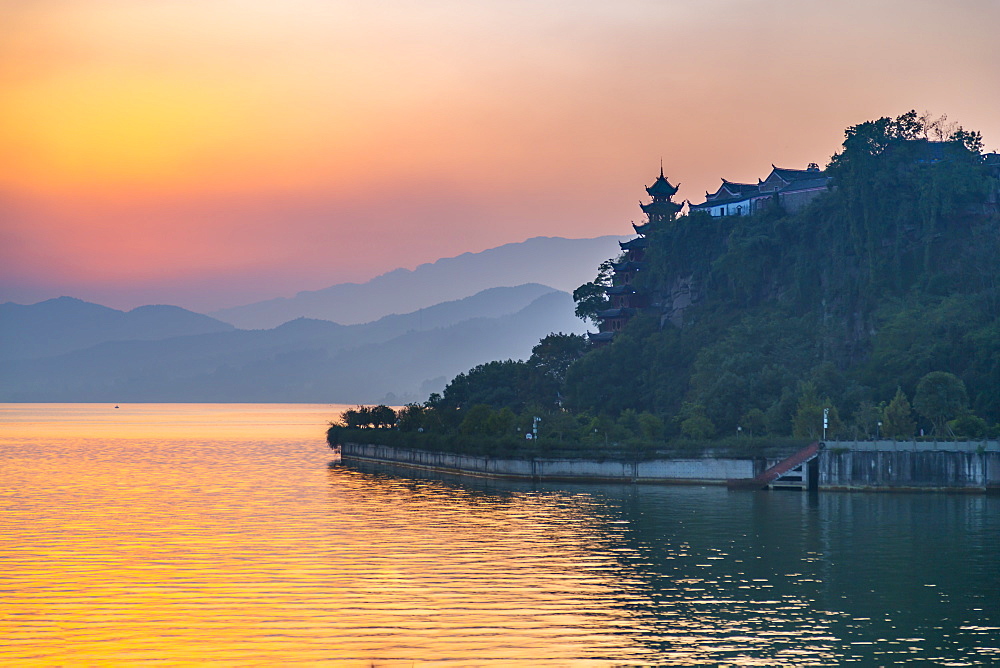 View of Shi Baozhai Pagoda at sunset on Yangtze River near Wanzhou, Chongqing, People's Republic of China, Asia