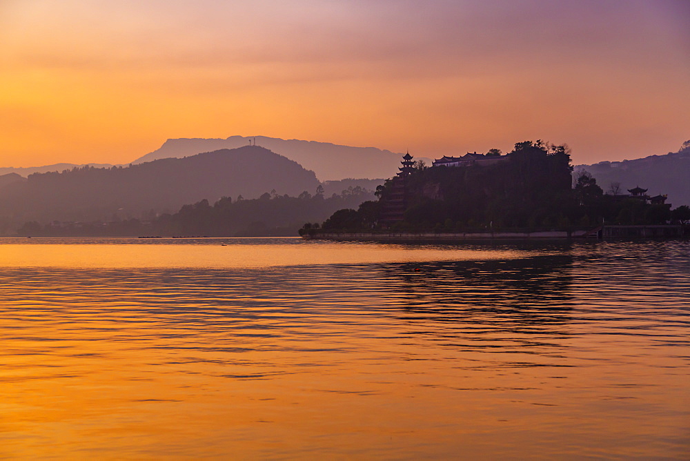 View of Shi Baozhai Pagoda at dusk on Yangtze River near Wanzhou, Chongqing, People's Republic of China, Asia