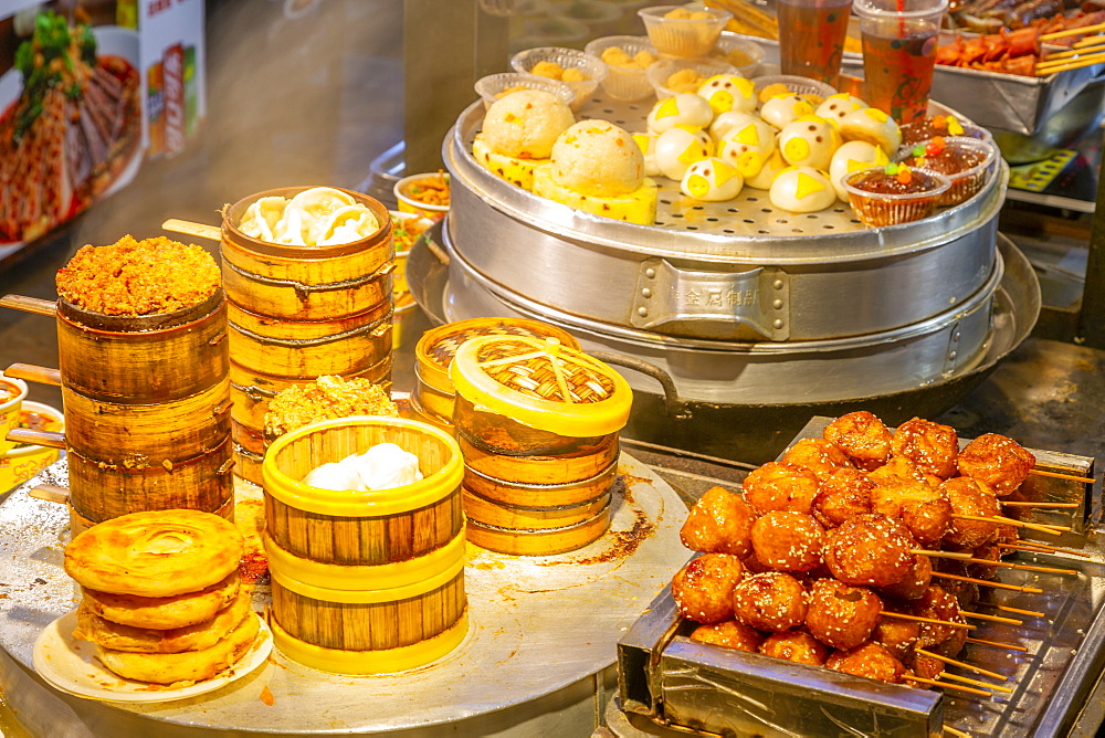 Local Chinese food in Kuanxiangzi Alley at night, Chengdu, Sichuan Province, People's Republic of China, Asia