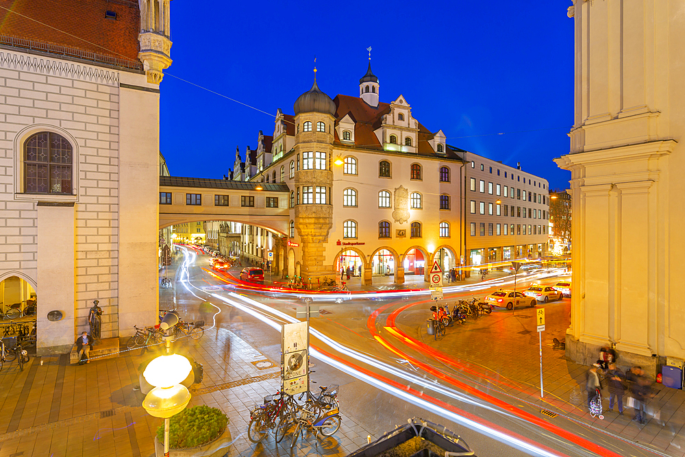 View of trail lights on street near Old Town Hall at dusk, Munich, Bavaria, Germany, Europe