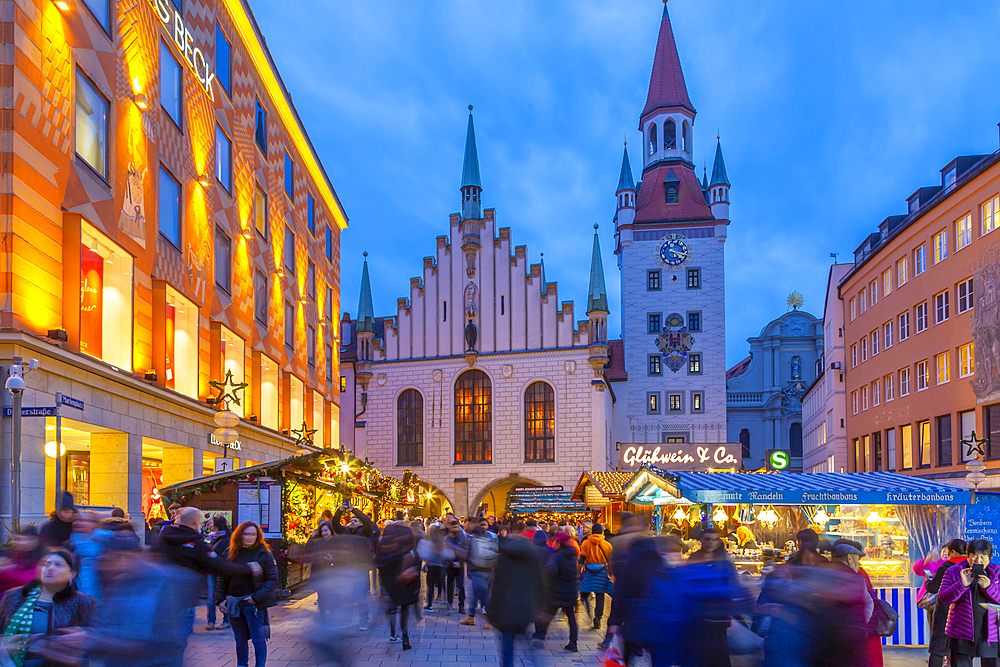 View of Old Town Hall and bustling Christmas Market in Marienplatz at dusk, Munich, Bavaria, Germany, Europe
