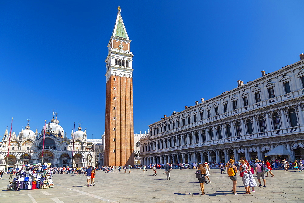 View of Campanile and visitors in St. Mark's Square and blue sky, Venice, UNESCO World Heritage Site, Veneto, Italy, Europe