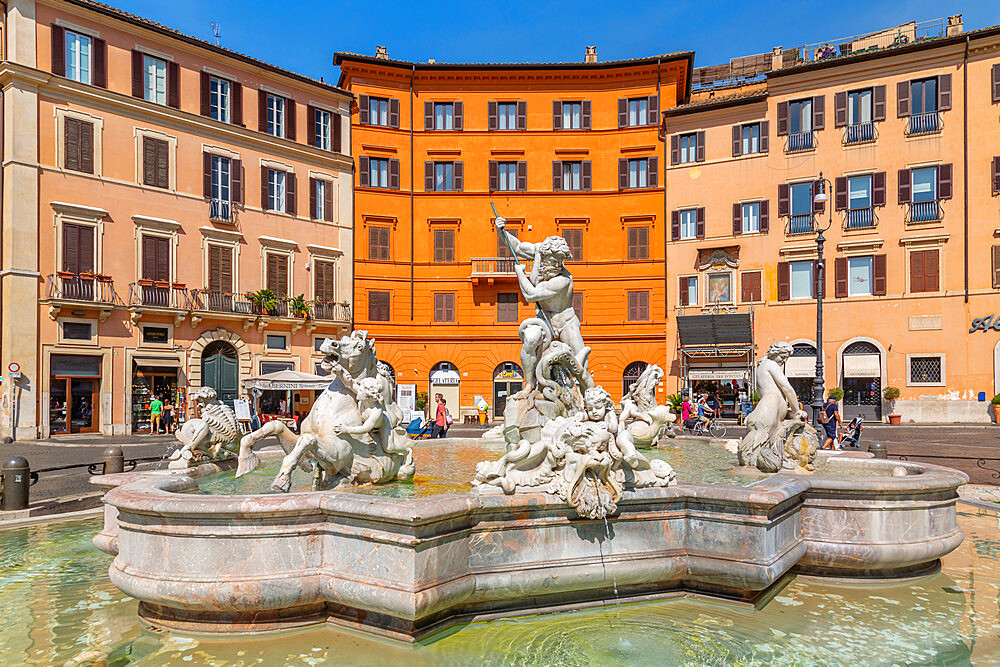 View of the Neptune Fountain and colourful architecture in Piazza Navona, Piazza Navona, UNESCO World Heritage Site, Rome, Lazio, Italy, Europe