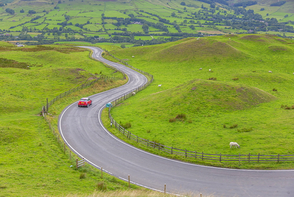 View of winding road toward Edale, Vale of Edale, Peak District National Park, Derbyshire, England, United Kingdom, Europe