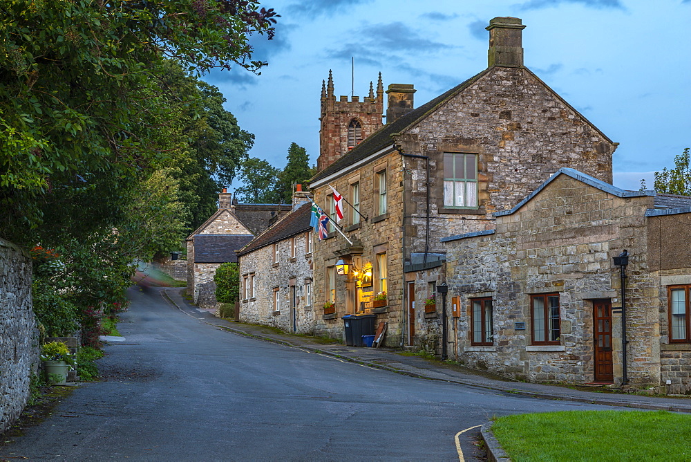 View of village houses and St. Giles' Church at dusk, Hartington, Peak District National Park, Derbyshire, England, United Kingdom, Europe