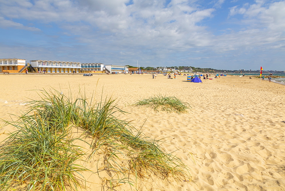 View of beach huts overlooking Sandbanks Beach in Poole Bay, Poole, Dorset, England, United Kingdom, Europe