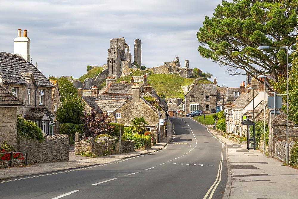 View of cottages on East Street and Corfe Castle, Corfe, Dorset, England, United Kingdom, Europe