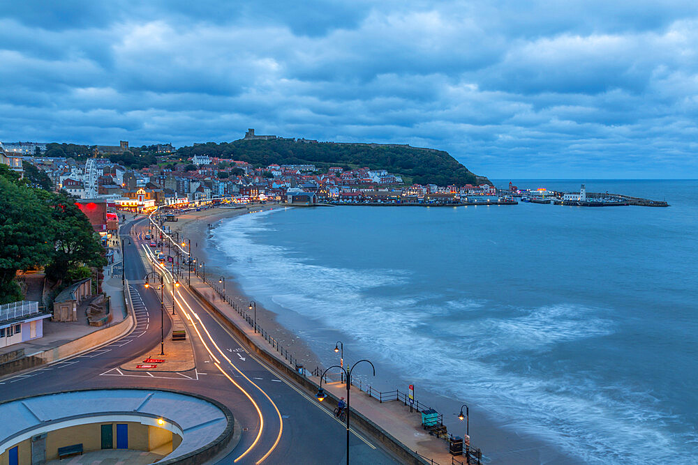 View of South Bay and Scarborough at dusk, Scarborough, North Yorkshire, Yorkshire, England, United Kingdom, Europe