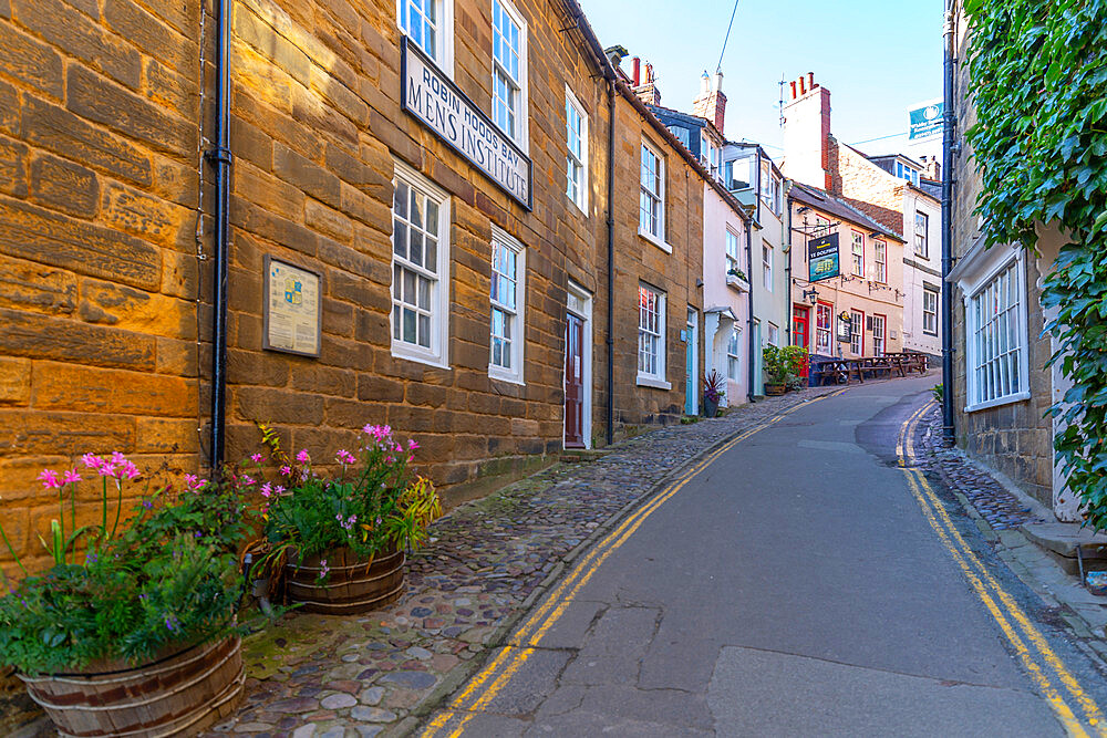 View of pastel coloured houses on King Street in Robin Hood's Bay, North Yorkshire, England, United Kingdom, Europe