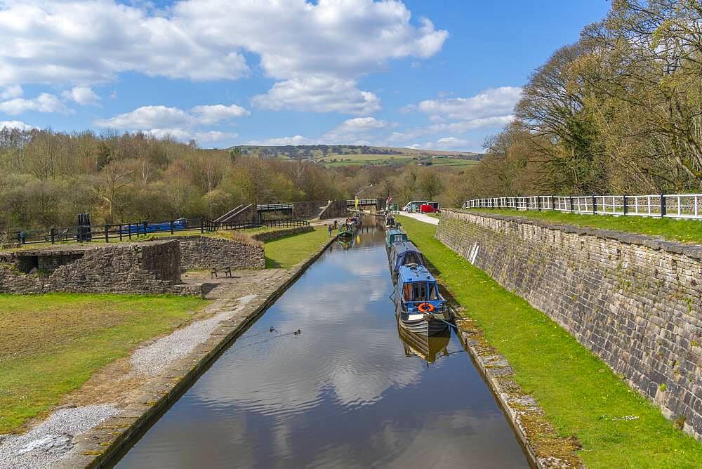 View of narrow boats at Bugsworth Basin, Bugsworth, Peak Forest Canal, High Peak, Derbyshire, England, United Kingdom, Europe