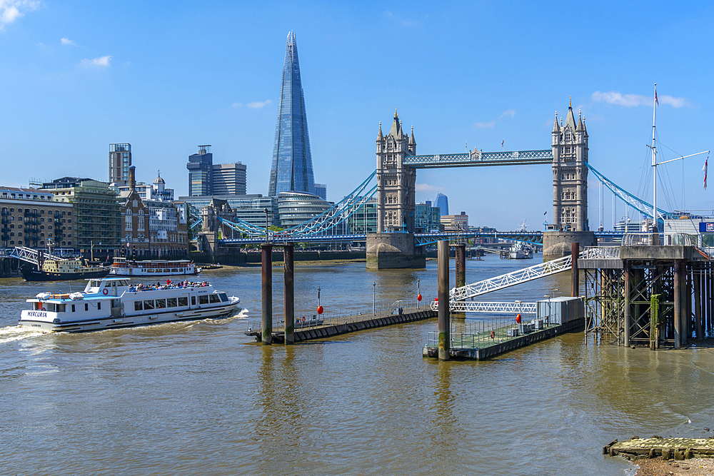 View of Tower Bridge and The Shard with tour boat on the River Thames, London, England, United Kingdom, Europe