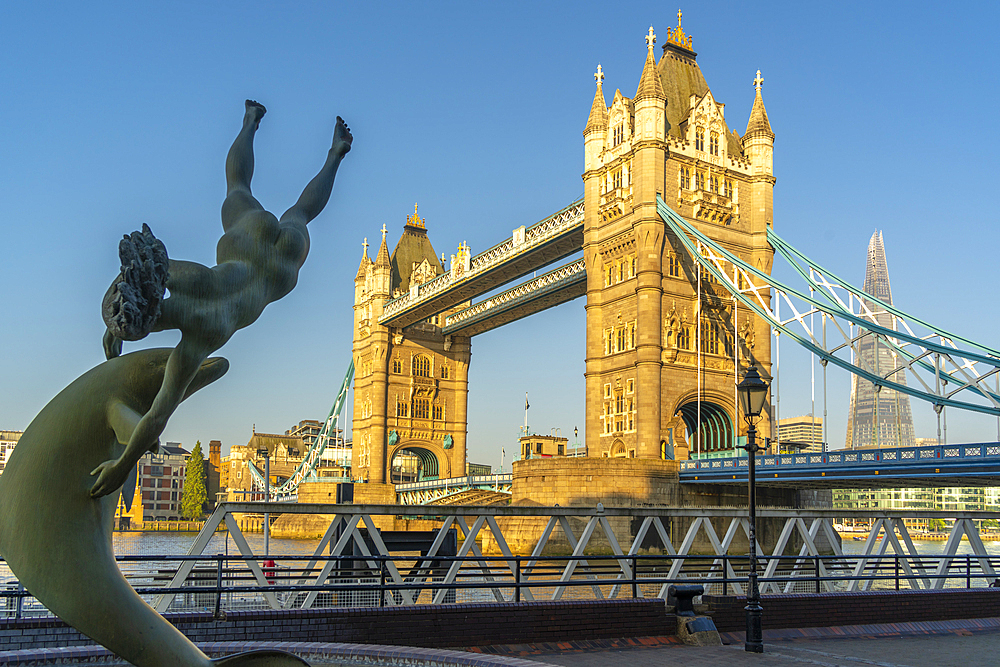 View of Tower Bridge and Girl with a Dolphin statue, London, England, United Kingdom, Europe