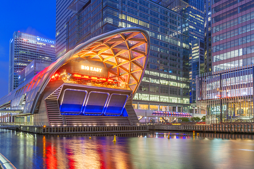 View of the Crossrail Station in Canary Wharf and tall buildings at dusk, Docklands, London, England, United Kingdom, Europe