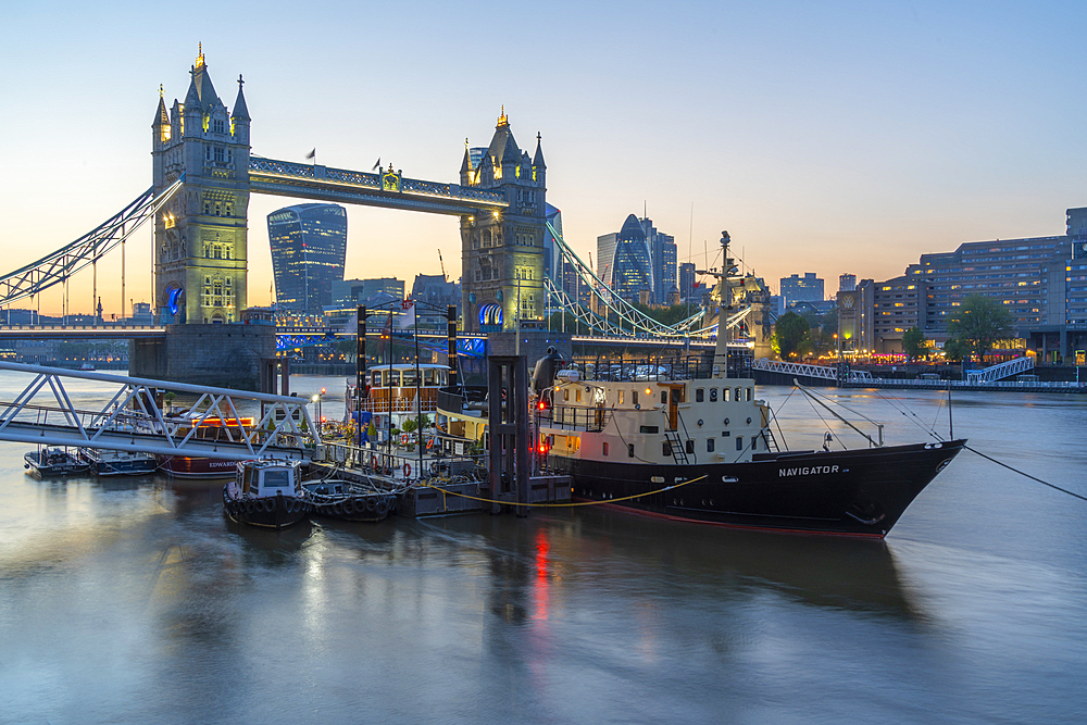 View of Tower Bridge and the City of London in the background at dusk, London, England, United Kingdom, Europe