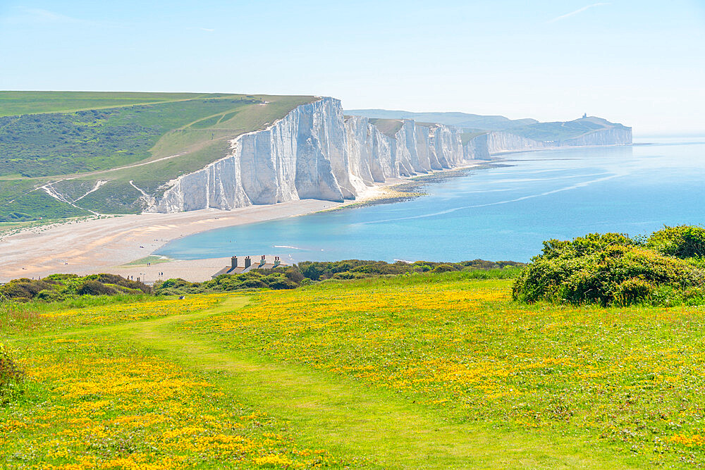 View of Seven Sisters Chalk Cliffs and Coastguard Cottages at Cuckmere Haven, South Downs National Park, East Sussex, England, United Kingdom, Europe