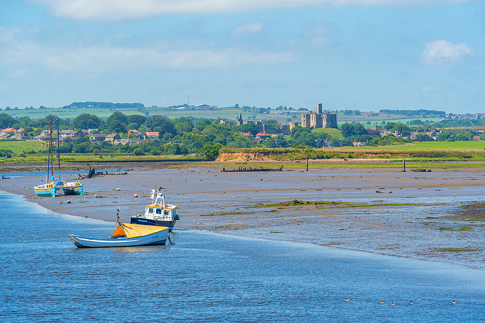 View of Warkworth Castle and boats on River Coquet from Amble, Morpeth, Northumberland, England, United Kingdom, Europe