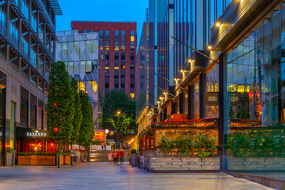 View of restaurants and buildings in Springfields at dusk, Manchester, Lancashire, England, United Kingdom, Europe