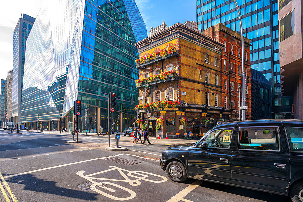 View of The Albert, an old London pub, in Victoria Street surrounded by modern buildings, Westminster, London, England, United Kingdom, Europe