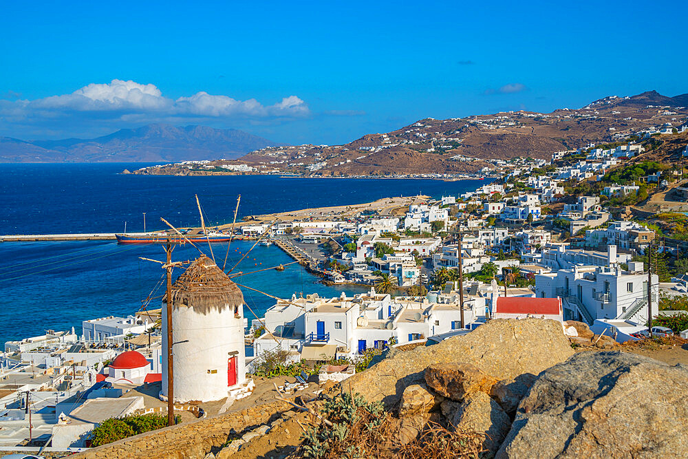 View of whitewashed windmill overlooking town and harbour, Mykonos Town, Mykonos, Cyclades Islands, Greek Islands, Aegean Sea, Greece, Europe