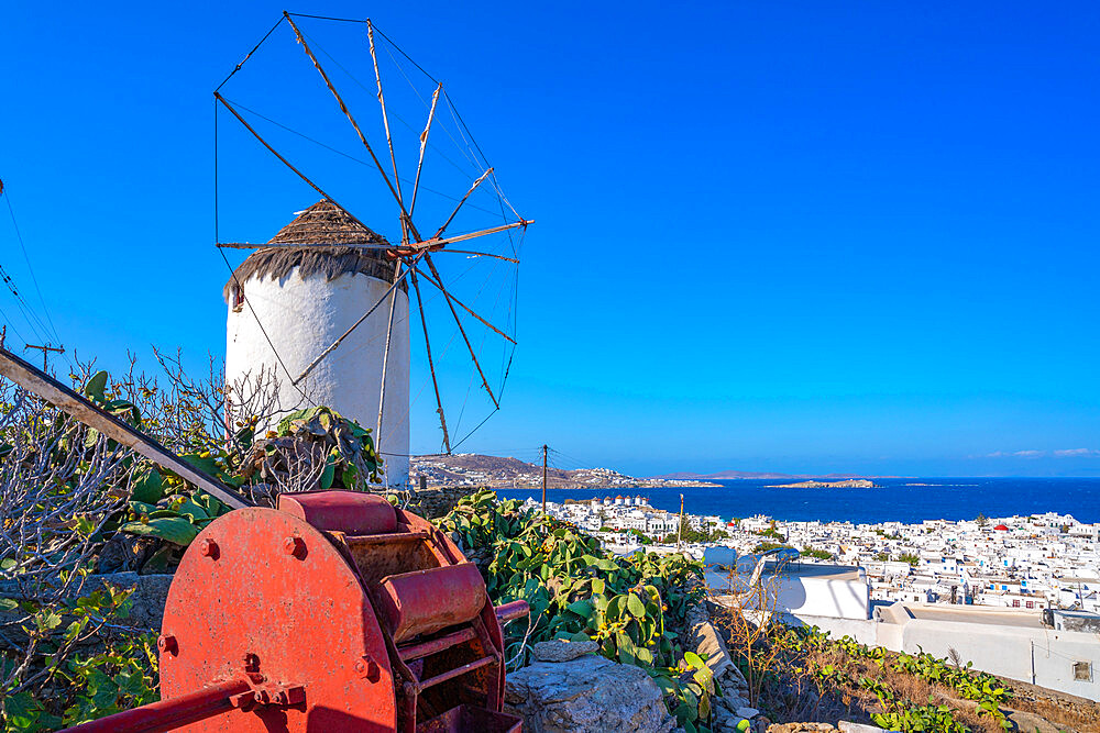 View of whitewashed windmill overlooking town, Mykonos Town, Mykonos, Cyclades Islands, Greek Islands, Aegean Sea, Greece, Europe