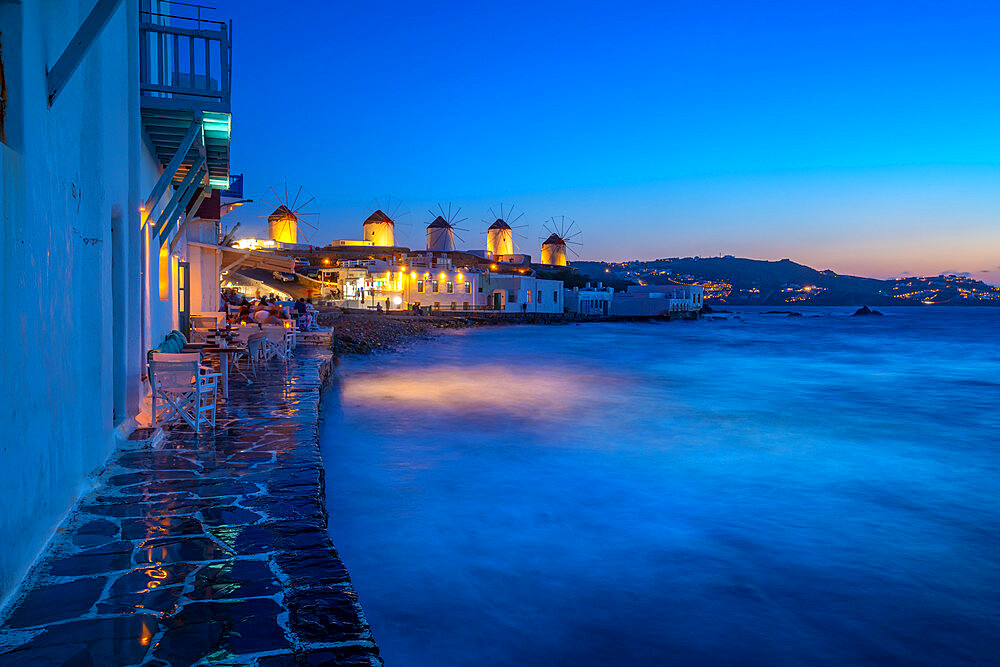 View of windmills from Little Venice in Mykonos Town at night, Mykonos, Cyclades Islands, Greek Islands, Aegean Sea, Greece, Europe