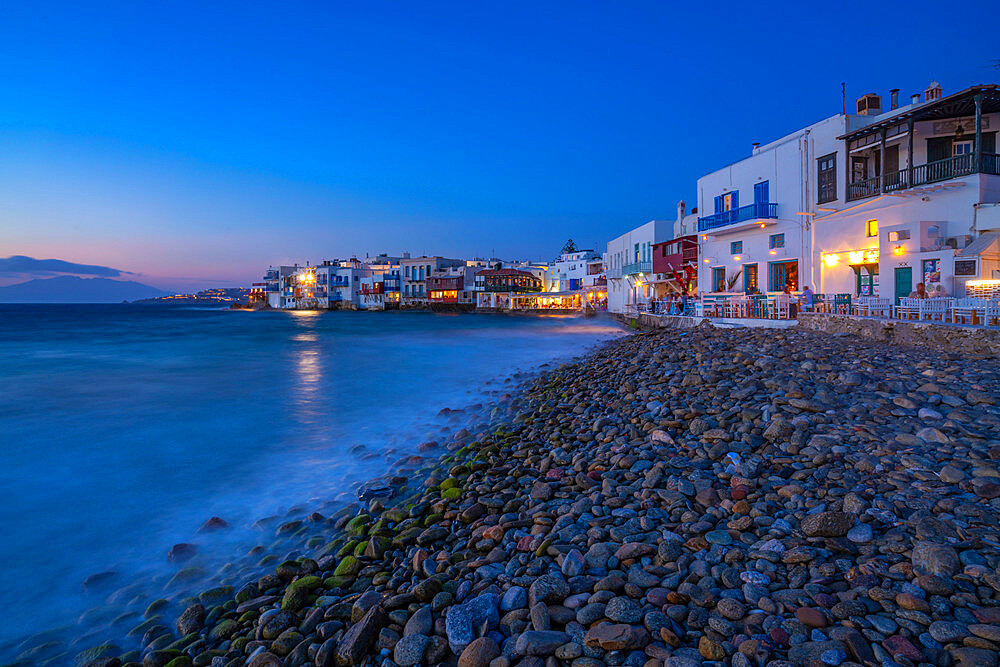 View of restaurants and pebble beach at Little Venice in Mykonos Town at night, Mykonos, Cyclades Islands, Greek Islands, Aegean Sea, Greece, Europe