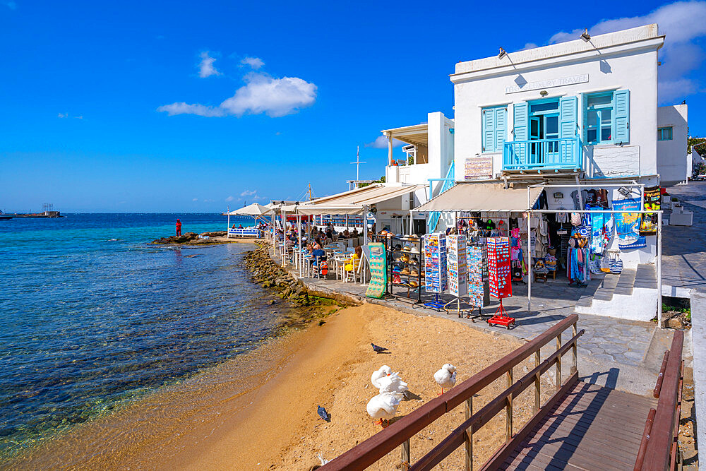 View of restaurant overlooking Old Port Beach, Mykonos Town, Mykonos, Cyclades Islands, Greek Islands, Aegean Sea, Greece, Europe