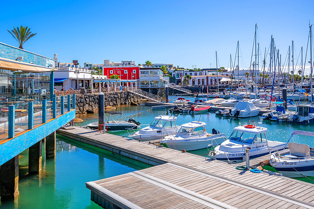 View of boats and the restaurants in Rubicon Marina, Playa Blanca, Lanzarote, Canary Islands, Spain, Atlantic, Europe