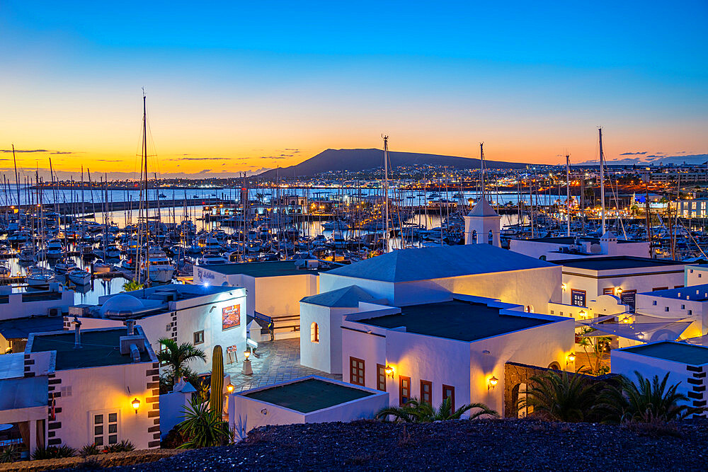 View of marina and shops at dusk in Marina Rubicon, Playa Blanca, Lanzarote, Canary Islands, Spain, Atlantic, Europe