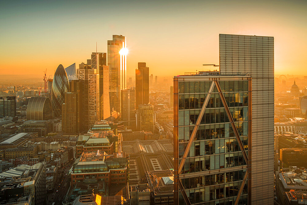 View of City of London skyscrapers and St. Paul's Cathedral at golden hour from the Principal Tower, London, England, United Kingdom, Europe