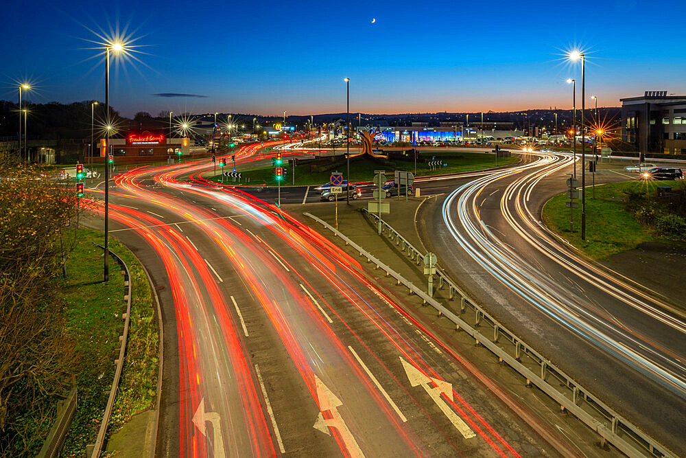 View of trail lights on Hornsbridge Roundabout at dusk, Chesterfield, Derbyshire, England, United Kingdom, Europe