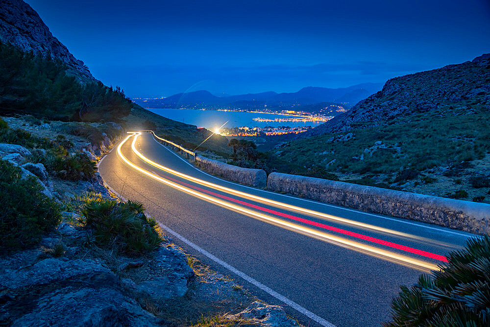 View of trail lights on road to Port de Pollenca at Mirador Es Colomer, Pollenca, Majorca, Balearic Islands, Spain, Mediterranean, Europe