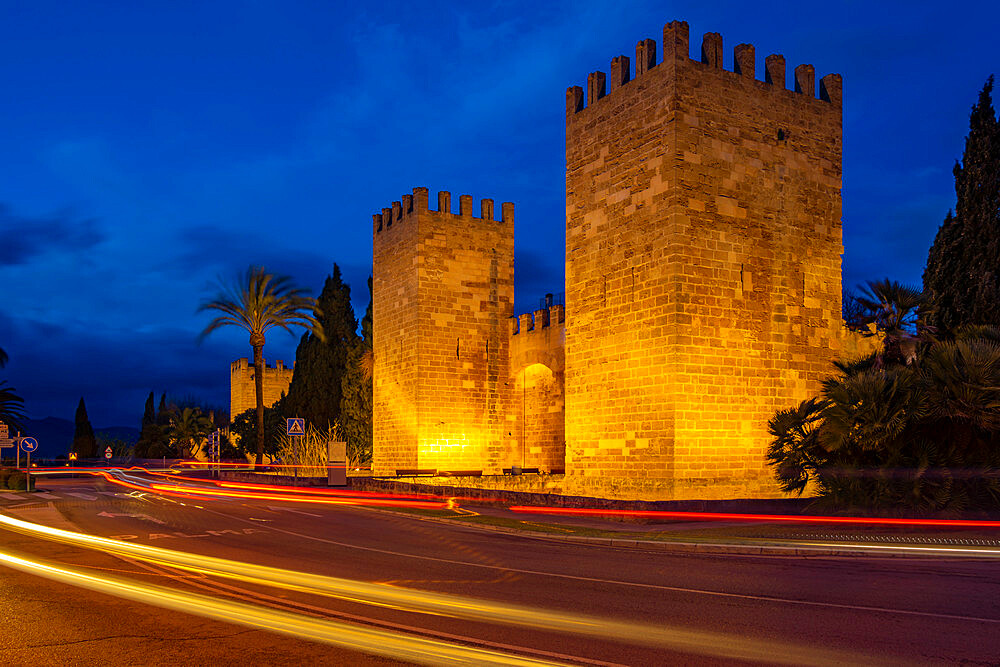 View of Old Town Gate and fortified walls in the old town at dusk, Alcudia, Majorca, Balearic Islands, Spain, Mediterranean, Europe