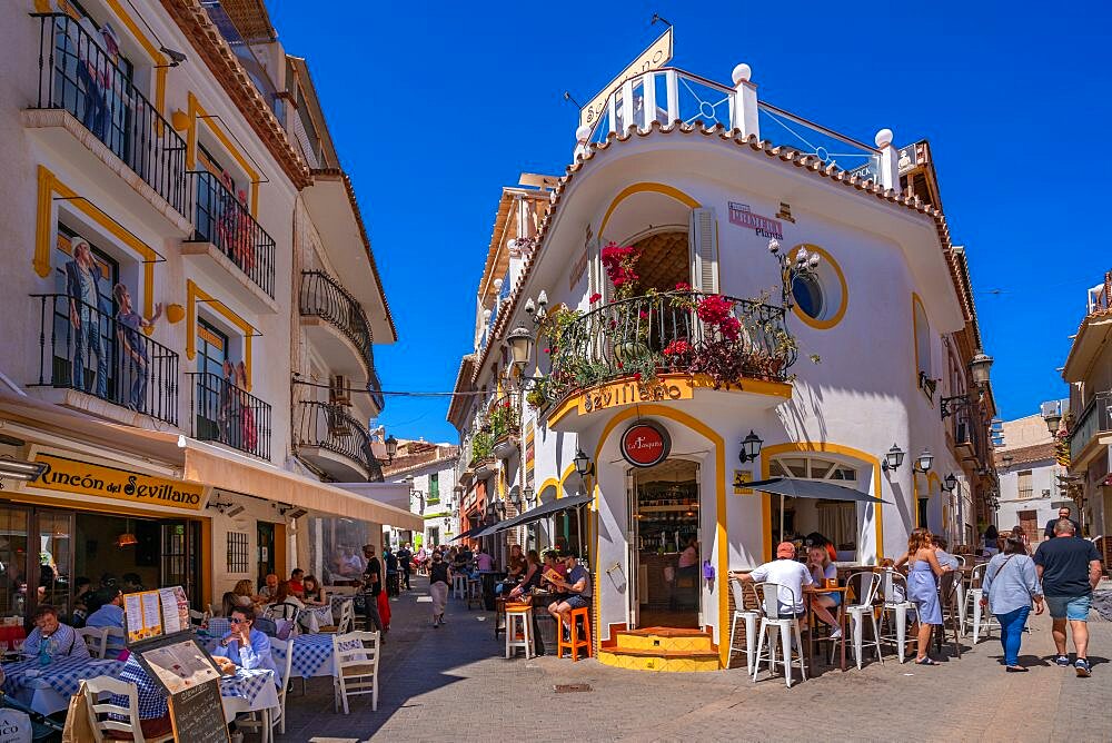 View of cafes and restaurants in the old town of Nerja, Nerja, Costa del Sol, Malaga Province, Andalusia, Spain, Europe