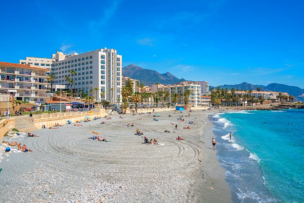 View of beach, hotels and coast at Nerja, Nerja, Malaga Province, Andalucia, Spain, Europe