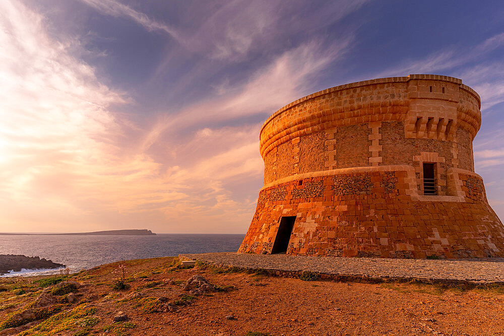 View of Fornelles Tower fortress and Mediterrainean Sea at sunset in Fornelles, Fornelles, Menorca, Balearic Islands, Spain, Mediterranean, Europe