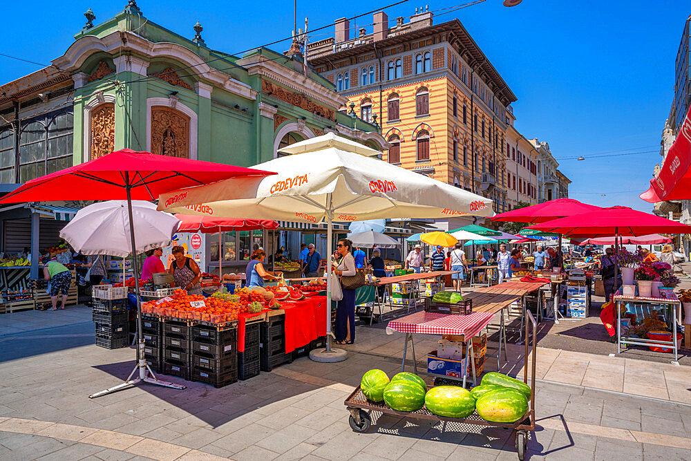 View of fruit and vegetable stall and exterior of ornate Central Market building, Rijeka, Croatia, Europe