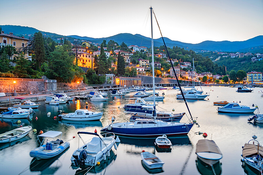 View of boats in the harbour at Ika at dusk, Ika, Kvarner Bay, Eastern Istria, Croatia, Europe