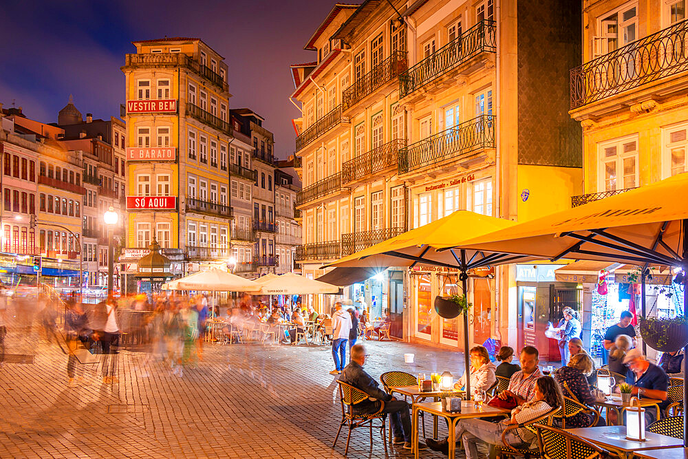 View of cafes in Praca de Almeida Garrett at night, Porto, Norte, Portugal, Europe