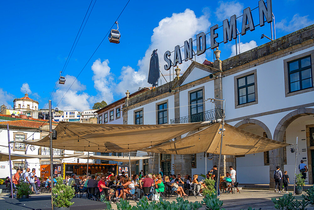 View of cafes and restaurants overlooked by Igreja da Serra do Pilar church, Porto, Norte, Portugal, Europe