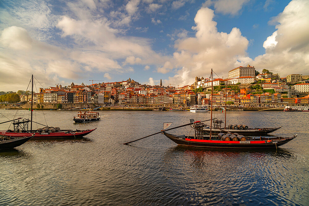 View of the Douro River and Rabelo boats aligned with colourful buildings, Porto, Norte, Portugal, Europe