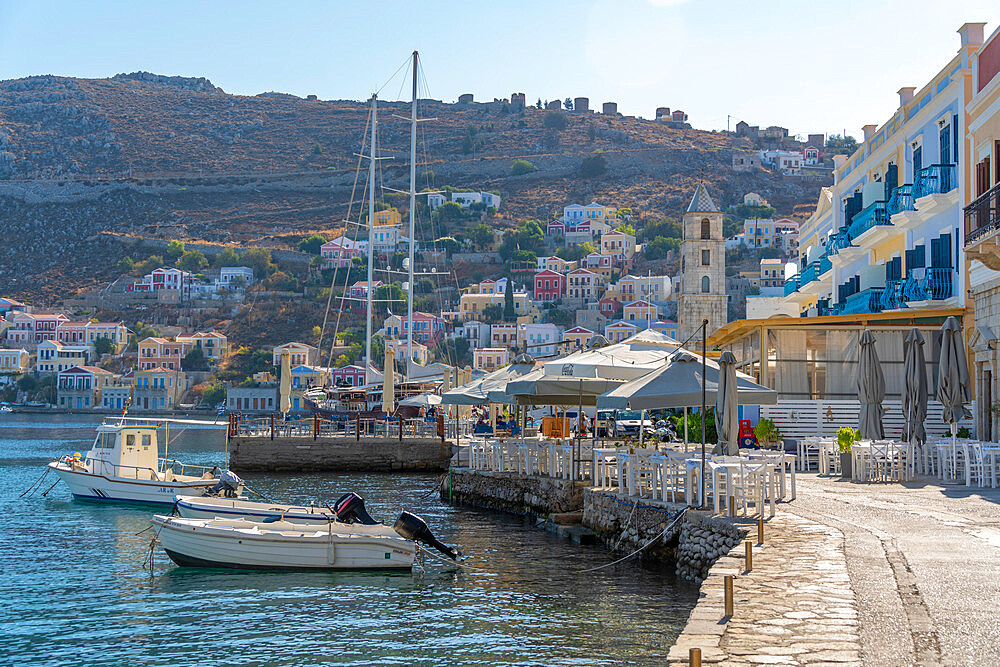 View of boats in harbour of Symi Town, Symi Island, Dodecanese, Greek Islands, Greece, Europe