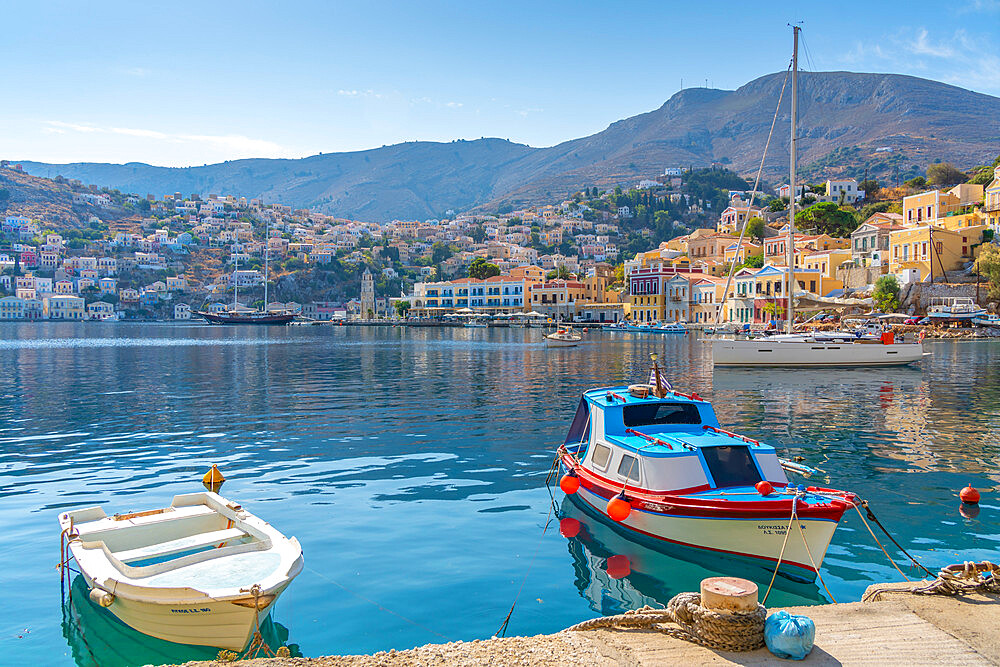 View of boats in harbour of Symi Town, Symi Island, Dodecanese, Greek Islands, Greece, Europe