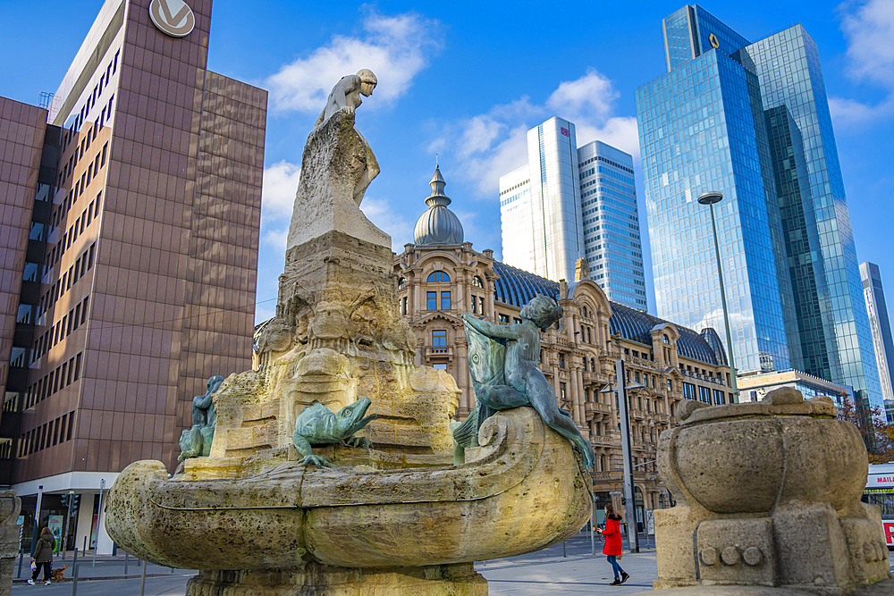 View of financial district skyline, Marchenbrunnen fountain and the Euro Sculpture, Willy Brandt Platz, Frankfurt am Main, Hesse, Germany, Europe