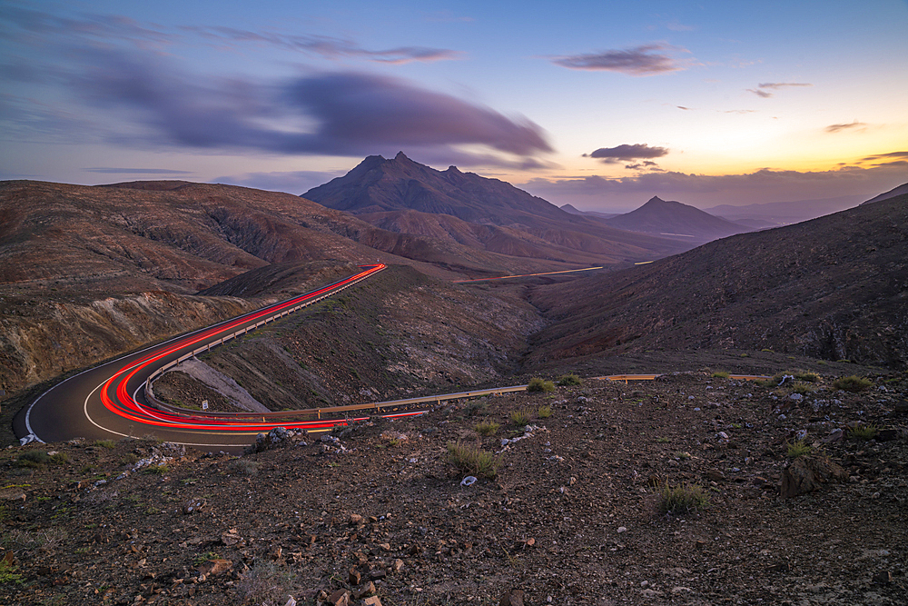 View of road trail lights and mountains from Astronomical viewpoint Sicasumbre at dusk, Pajara, Fuerteventura, Canary Islands, Spain, Atlantic, Europe