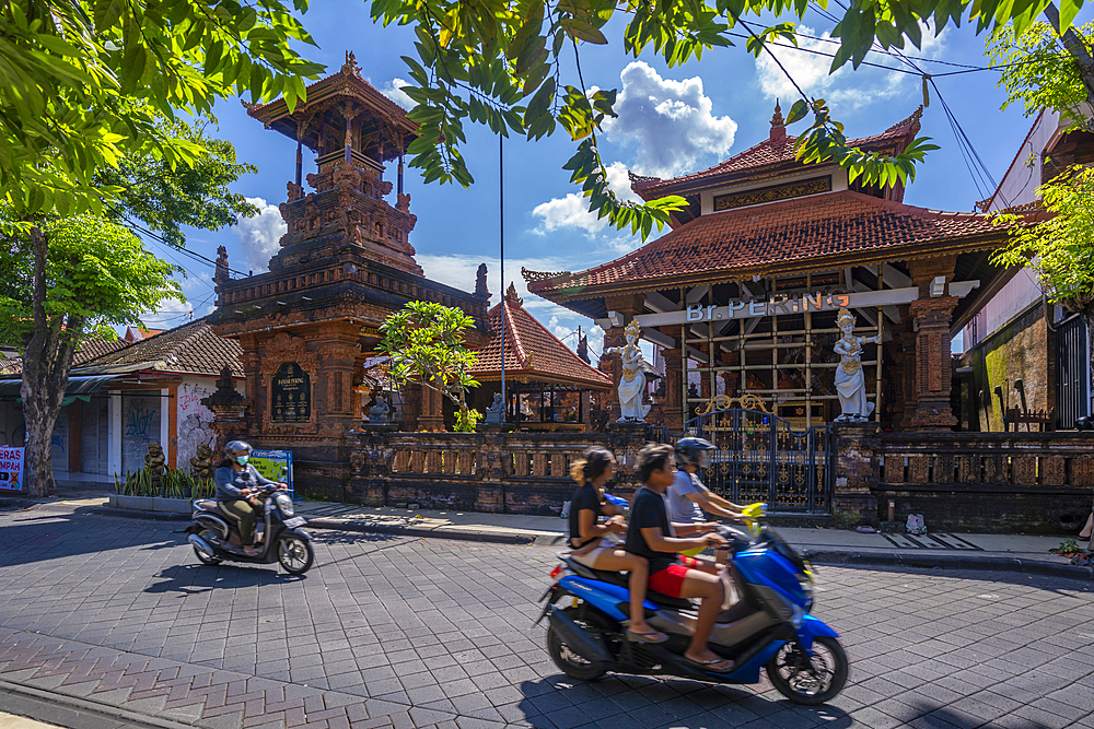 View of temple on street in Kuta, Kuta, Bali, Indonesia, South East Asia, Asia